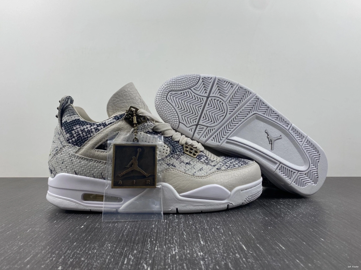 - 819139-030 Retro Snakeskin Jordan 4 1225